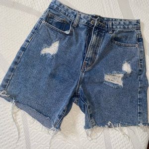 Womens mom jean shorts with rips and fringe at the bottom